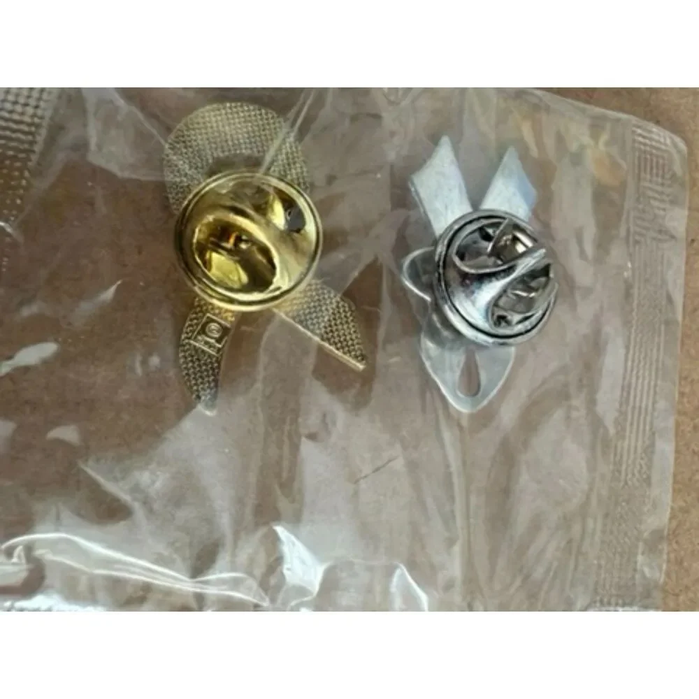 Pink Ribbon label pins one with FORD in center